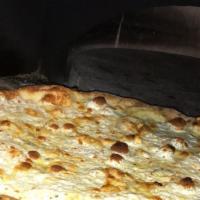 Quattro Formaggi · Fresh mozzarella, Gorgonzola dolce, fontina & Parmesan cheese