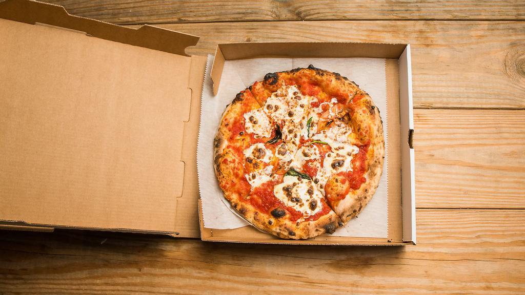 Bianca Pizza · Fresh Mozzarella, garlic, oregano, Parmigiano Reggiano, D.O.P., EVOO.