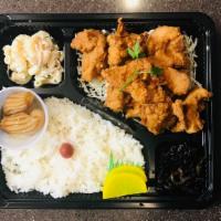 Bento Karaage Chicken 鳥の唐揚 · deep fried lightly battered chicken, sides ( vary) and rice.