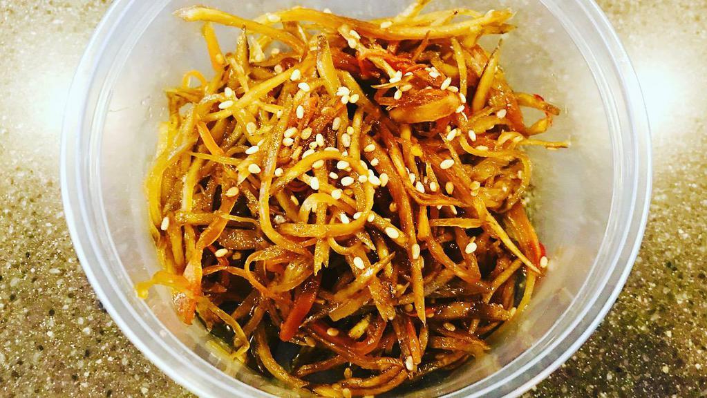 Kimpira Goboきんぴらごぼう · Home-made kimpira gobo.Burdock and carrots cut in very skillful slices and  seasoned with Japanese flavors.
 Great to add extra veggies to any meal to make it healthier- highly antioxidants!