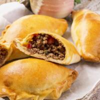 Beef Empanada · Delicious puff pastries stuffed with beef.