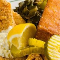Fried Catfish Box · 2 piece cornmeal battered fried catfish with cornbread, cole slaw, pickles and choice of side.