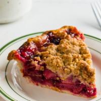 Sour Cherry Pie · Sour cherry, fresh pears and ginger with cinnamon streusel top in a buttery crust.