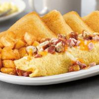 Meat Lover Omelet · Ham, bacon, sausage, and pepper jack cheese.