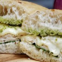 Spinach Pesto Sandwich · Hot chicken, baby spinach, with melted provolone cheese, and basil pesto sauce on ciabatta.