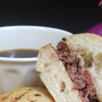 French Dip Sandwich · Hot roast beef, with melted Swiss cheese, and garlic butter on ciabatta, served with a side ...