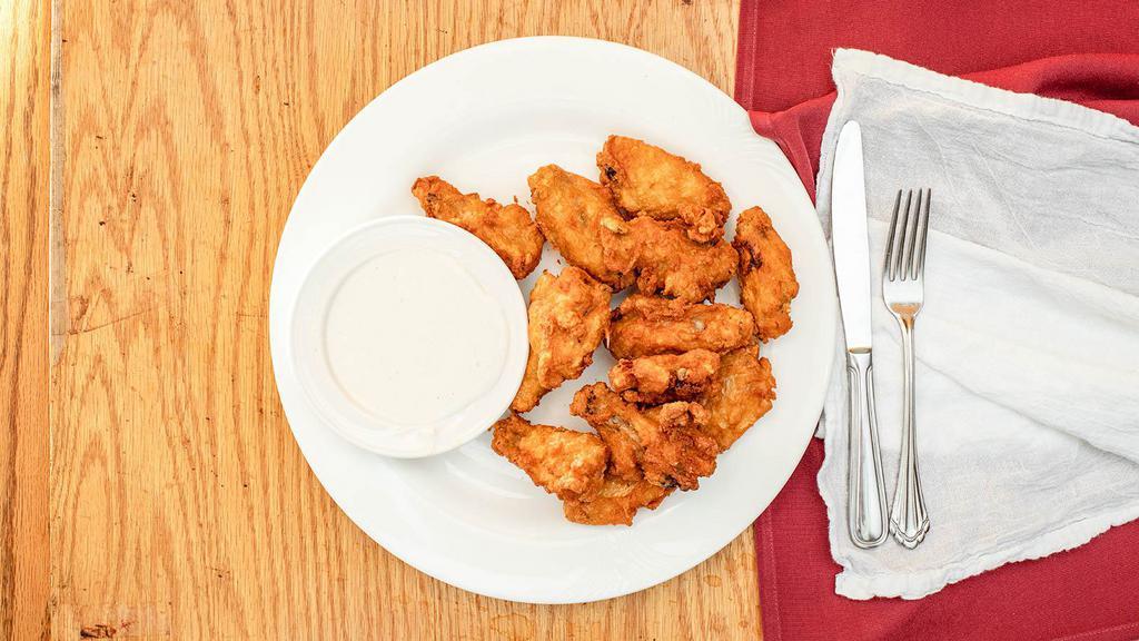One Dozen Fried Chicken Wings · 1 doz. Served buffalo style with creamy blue cheese or plain with honey mustard or barbeque sauce.
