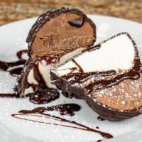 Coco Tartufo · Vanilla and chocolate ice cream with raspberry nut jam in center enrobed in dark chocolate.