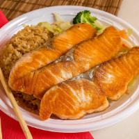 Bento Salmon Teriyaki · Served with 4 pcs of california roll garden salad rice and fruit (edamame required). consumi...