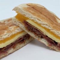 English Muffin With Egg & Bacon · Toasted English Muffin with Bacon, Egg & Cheddar Cheese.