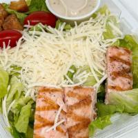 Grilled Salmon Caesar Salad · Grilled Salmon, Shredded Parmesan, Grape Tomatoes, Croutons over Romaine Lettuce with Caesar...
