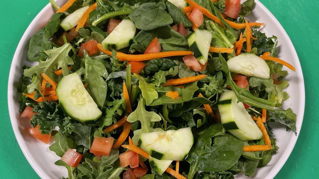 House Salad · Mixed greens, heirloom cherry tomatoes, cucumbers, carrots, balsamic dressing.