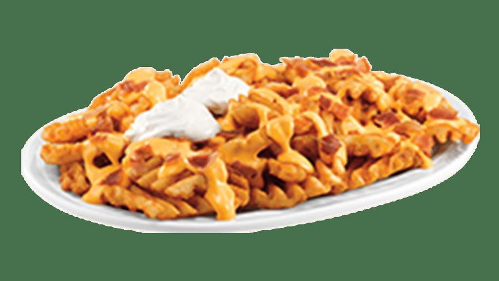 Loaded Waffle Fries · There’s a reason you keep coming back for more. Crispy waffle fries loaded up with melted Cheddar cheese sauce, bacon and—yes—. sour cream.