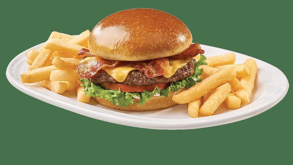 Bacon Cheeseburger · No one can resist a juicy Friendly’s Big Beef® burger topped with melted American cheese, applewood-smoked bacon, lettuce, tomato and mayo on a grilled Brioche bun.  Served with golden fries.