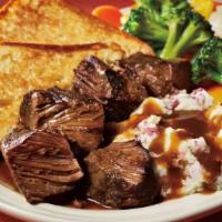 Oven Roasted Beef Brisket · Enjoy six ounces of extra tender brisket; served with steamed vegetables, gravy-topped garli...