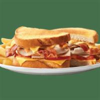 Turkey Club Supermelt® · Tasty turkey breast layered with applewood-smoked bacon, melted American cheese, tomato and ...