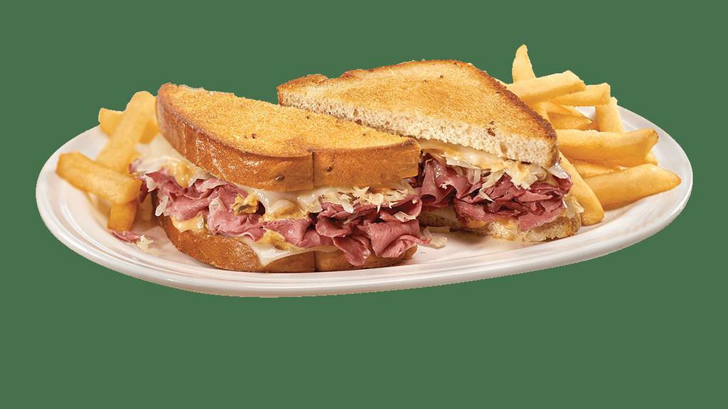 Reuben Supermelt® · We’ll bring the deli to you with tender Brisket corned beef, melted Swiss cheese, tangy sauerkraut and Thousand Island dressing on grilled marble rye bread.   Served with a side of golden fries.