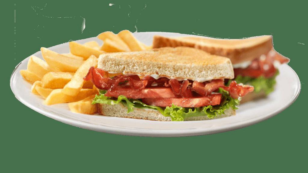 Friendly'S Blt · Irresistible strips of applewood-smoked bacon, fresh lettuce, tomato and a dollop of mayo on toasted sourdough bread.   Served with a side of golden fries.