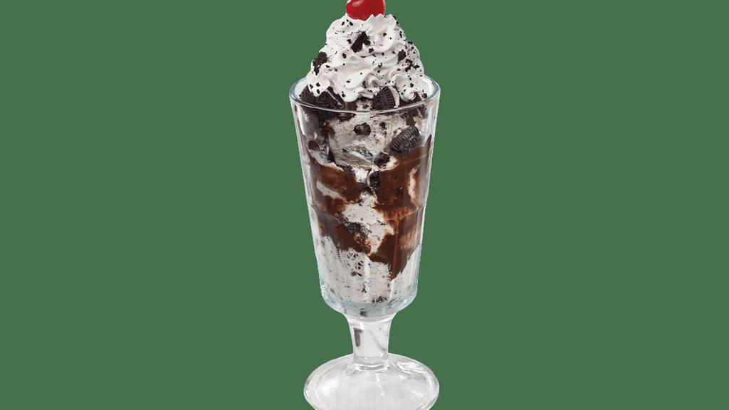 Ultimate Cookies 'N Cream Sundae · Cookies 'N Cream ice cream smothered with signature hot fudge and Oreo® Cookie Pieces.