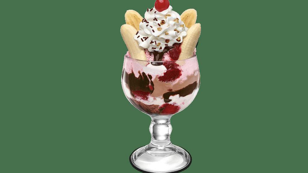 Jim Dandy™ · Stay classic with Strawberry, Vanilla and Chocolate ice cream covered in marshmallow, strawberry and chocolate topping, freshly split banana, sprinkles and walnuts.
