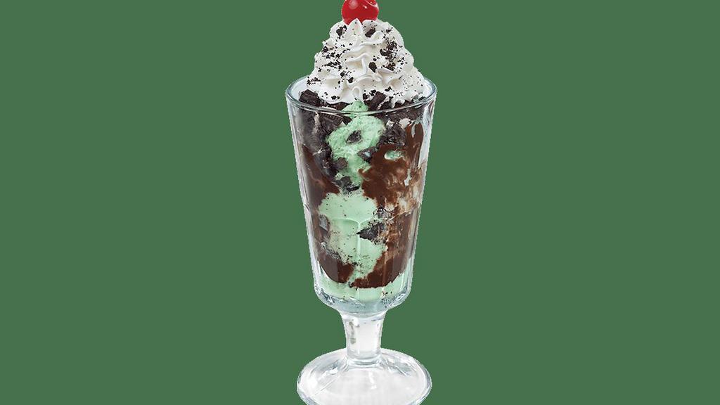 Mint Cookie Crunch Sundae · Mint Chocolate Chip ice cream with crushed Oreo® Cookie Pieces and our signature hot fudge.