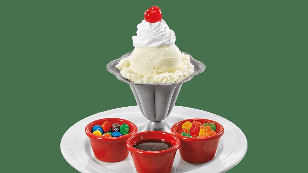 Kids Build Your Own Sundae · Pick your Ice Cream and 3 toppings.