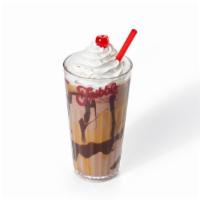 New! Fudgy Pb Nut Fribble! · Peanut buttery thick milkshake made with vanilla ice cream and fudge swirl, coated sugar con...