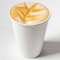 Cappuccino · Shot of espresso poured over foamed milk.