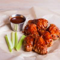 Bbq Wings · Golden, crispy, deep-fried wings, glazed with smoky and sweet BBQ sauce. Add on a dipping sa...