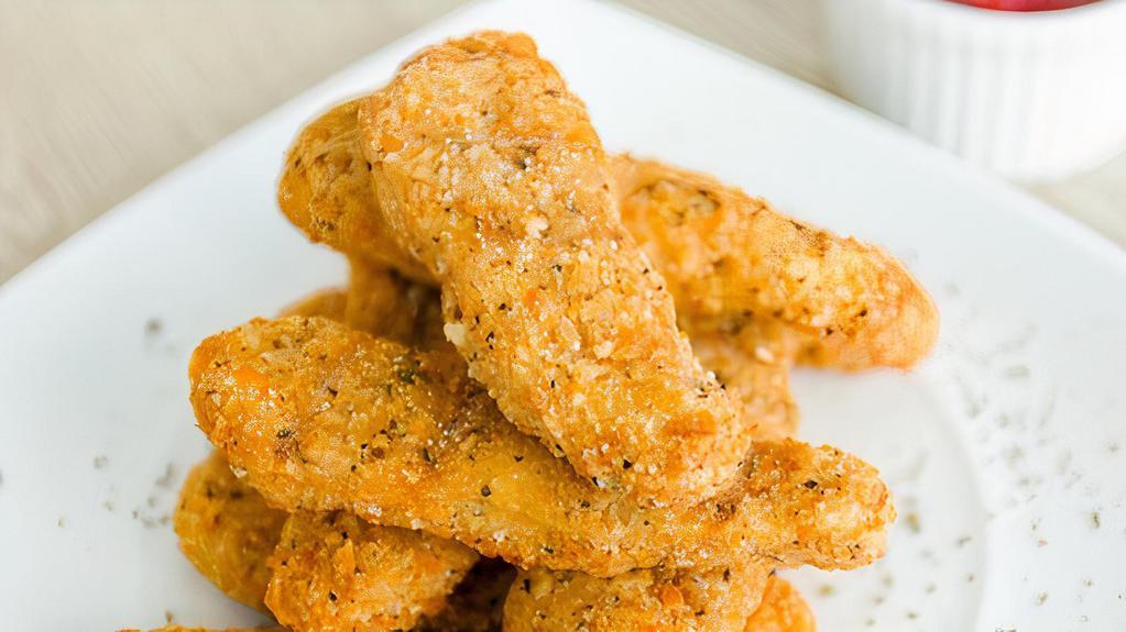 Chicken Tenders · Golden and crispy on the outside and tender and juicy on the inside chicken tenders. Choose a sauce and side!