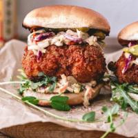 Sweet Chili Crispy Chicken Sandwich · Extra crispy, breaded chicken breast, fried until golden. Served on a soft bun with lettuce,...