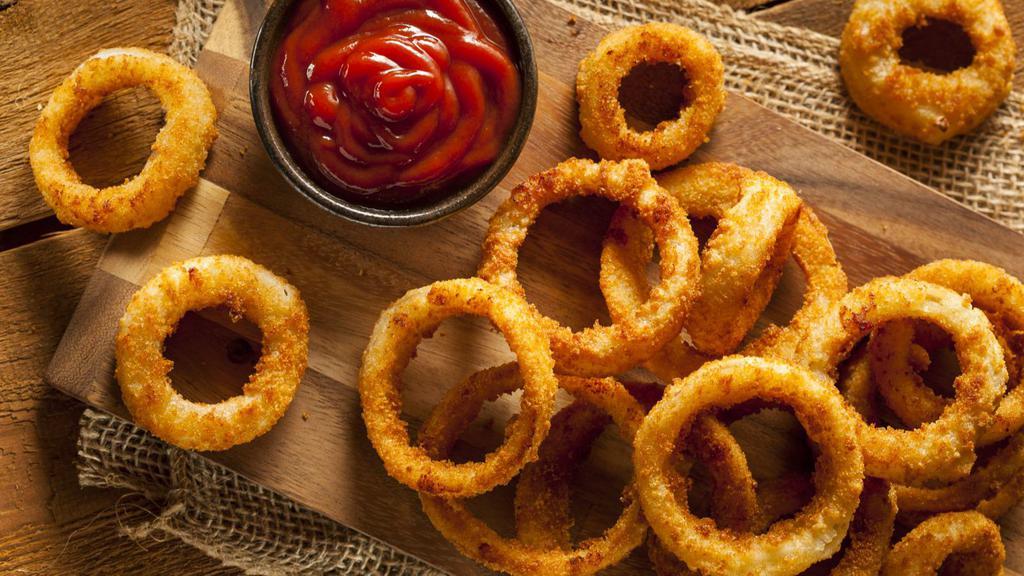 Onion Rings · Thick cut, battered onion rings fried to golden perfection.