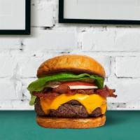 Bacon Cheeseburger · Juicy beef patty tossed on melted cheese, crispy bacon strips and burger buns with lettuce, ...