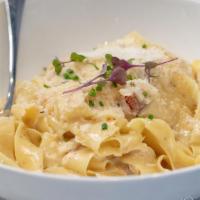 Fettuccine Tuscano · Fettuccine Pasta with Shrimp, White Beans, Shiitake Mushrooms & Garlic in a Creamy Pesto Sau...