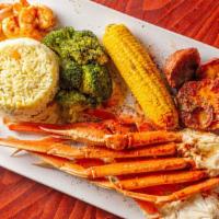 Bae Tray · Two large snow clusters, seven jumbo shrimp with rice, corn, broccoli, and roasted potatoes.