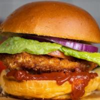 Spicy Fried Chicken · Hot stuff. Crispy fried chicken, sliced tomatoes, shredded lettuce, and hot sauce.