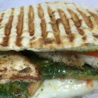 Italiano  Panini · Grilled chicken, mozzarella cheese, roasted peppers and pesto sauce.