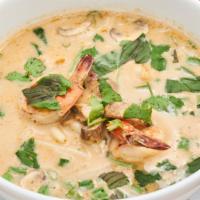 Coconut Noodle Soup · With tamarind,  bean sprouts,  mushrooms and herbs in a spicy coconut broth.