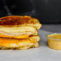 Roasted Turkey & Three Cheese Melt · Roasted turkey, Cheddar, Swiss, and Parmesan cheeses melted between buttery, toasted sourdou...