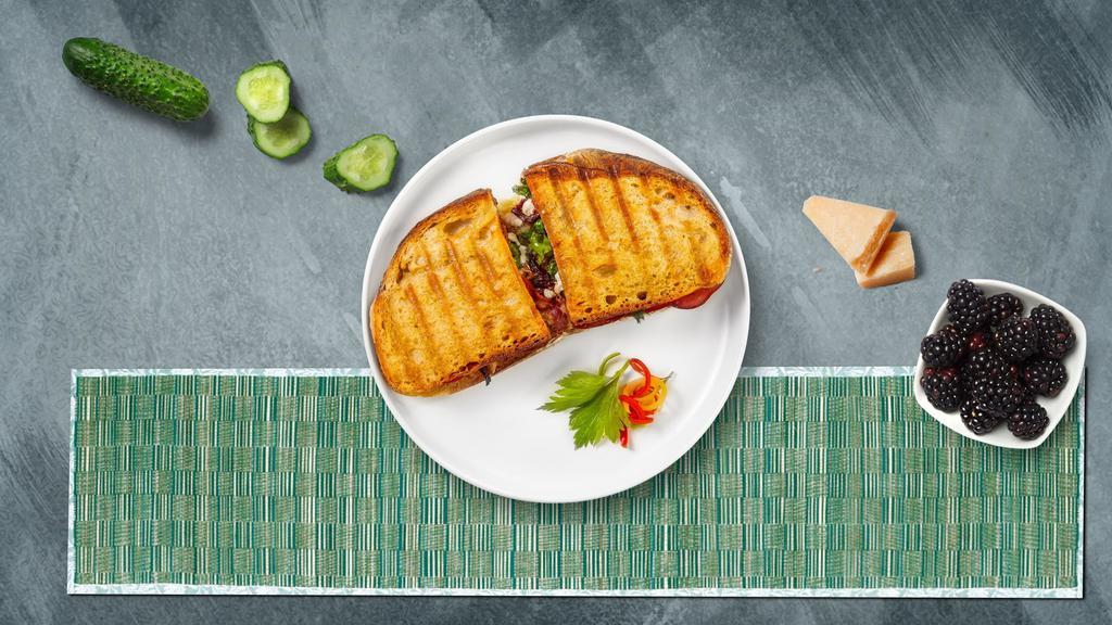 Blt Trip Panini · Crispy bacon, melted cheese, lettuce, and tomato served on your choice of toasted bread.