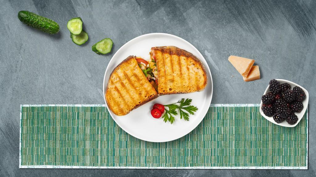 Grilled Chicken Grizzlies Panini · Grilled chicken, melted cheese, lettuce, and tomato served on your choice of toasted bread.