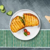 Chronicles Of Chicken Pesto Panini · Chicken, melted cheese, pesto, lettuce and tomato served on your choice of toasted bread.