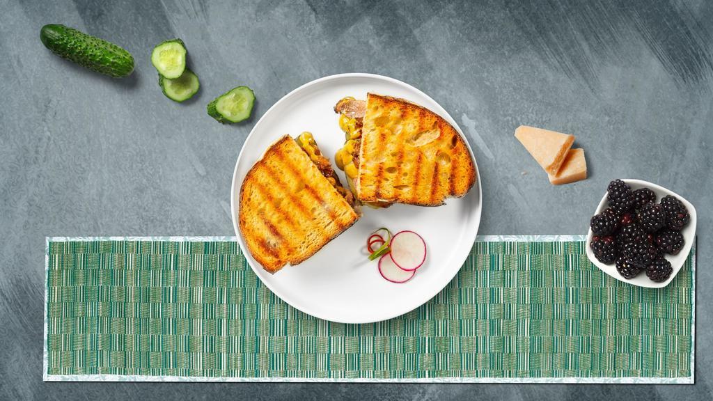 Papi Cuban Panini · Roasted pork, pork tenderloin, melted cheese, mustard, and pickles served on your choice of toasted bread.