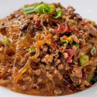 Ants Climb On Tree · Hot and spicy. Finely minced filet of beef stir fried with cellophane noodles in spicy garli...