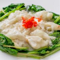 Crabmeat With Egg White · Lump crabmeat sauteed with egg white. Served on a bed of spinach.