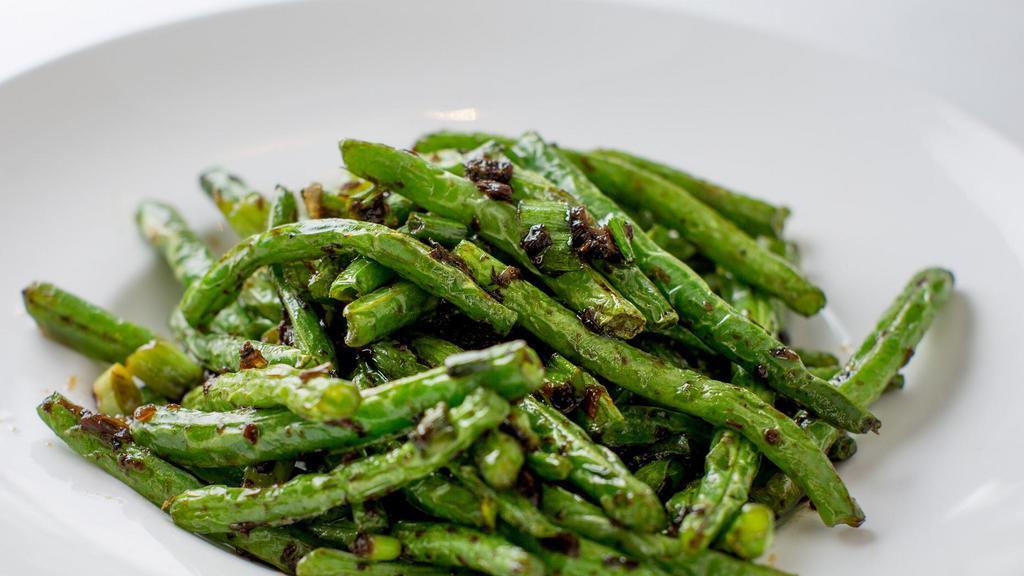 Dry Sauteed String Beans · Fresh spring bean sauteed with minced garlic pickle