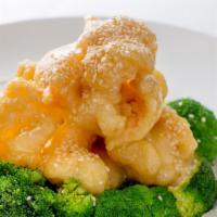 Grand Marnier Prawns · Jumbo prawns coated with water chestnut flour, fried until crispy, then sauteed in a Grand M...