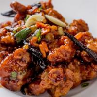 Chan Do Chicken With Scallions · Hot and spicy. Crispy chicken nuggets marinated with five spices, then sautéed with ginger, ...