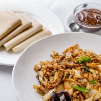 Moo Shu Pork With Chinese Crepes · Shredded pork loin sautéed in hoisin sauce with eggs and Chinese vegetables. Served with hom...