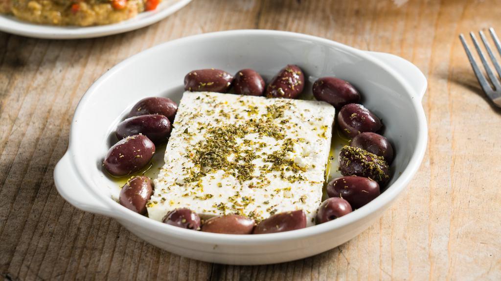 Feta Cheese And Kalamata Olives · Sprinkled with oregano and olive oil.